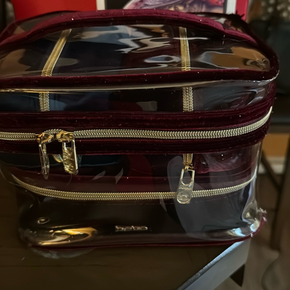 Bebe 4 piece make up bag set